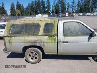 1987 Nissan Hardbody z VIN 1N6ND11S0HC379556, wystawiony jako IAAI lot #42064747 z przebiegiem 294 366 mil mil oraz . Historia ofert i sprzedaży dostępna na DreamBid. Obrazek 6.