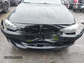 2015 BMW 3 Series 328i with VIN WBA3A5C59FF606236, listed as a IAAI auction lot 41690502 with 115,085 mi miles. Bid and sale history available at carsss.com. Image 6.