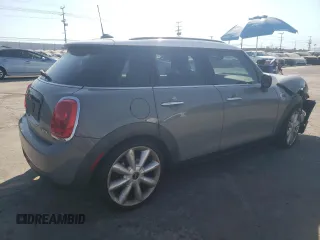 2016 MINI Hardtop 4 Door with VIN WMWXU1C59G2D11117, listed as a Copart auction lot 65191715 with 121,633 mi miles and Salvage title. Bid and sale history available at DreamBid. Image 3.