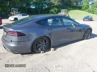 2022 Tesla Model S with VIN 5YJSA1E57NF479056, listed as a IAAI auction lot 42091009 with 78,272 mi miles and . Bid and sale history available at DreamBid. Image 6.