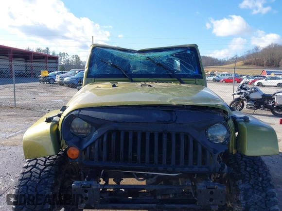 2007 Jeep Wrangler Unlimited Sahara with VIN 1J4GA59187L189519, listed as a IAAI auction lot 41204036 with 165,428 mi miles and . Bid and sale history available at DreamBid. Image 6.