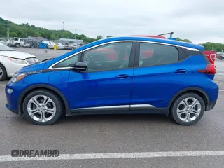 2020 Chevrolet Bolt EV LT z VIN 1G1FW6S0XL4145254, wystawiony jako IAAI lot #42255536 z przebiegiem 16 691 mil mil oraz . Historia ofert i sprzedaży dostępna na DreamBid. Obrazek 14.