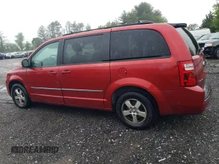 2010 Dodge Grand Caravan SXT z VIN 2D4RN5D10AR179773, wystawiony jako Copart lot #56855235 z przebiegiem 239 925 mil mil oraz Nie do naprawy • Non repairable. Historia ofert i sprzedaży dostępna na DreamBid. Obrazek 2.