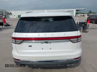2020 Lincoln Aviator Reserve with VIN 5LM5J7WC1LGL28593, listed as a IAAI auction lot 42137327 with 83,114 mi miles and . Bid and sale history available at DreamBid. Image 16.
