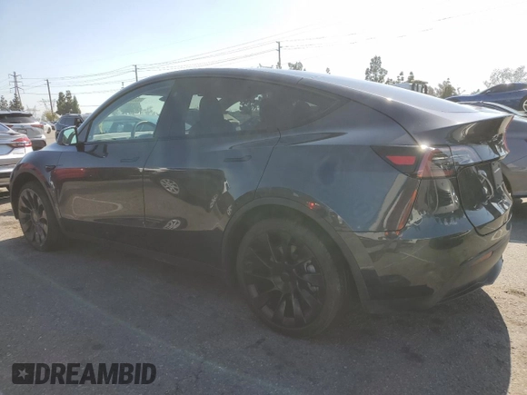 2024 Tesla Model Y with VIN 7SAYGDED7RF056973, listed as a Copart auction lot 55310705 with 15,391 mi miles and Salvage Title. Bid and sale history available at DreamBid. Image 2.
