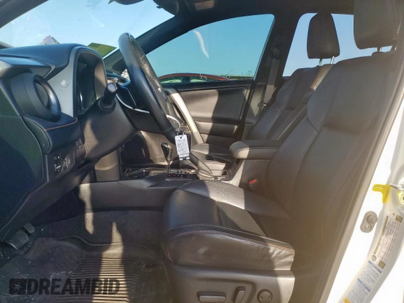 2016 Toyota RAV4 SE with VIN 2T3JFREV2GW456003, listed as a Copart auction lot 64136325 with 133,746 mi miles and Salvage title. Bid and sale history available at DreamBid. Image 7.