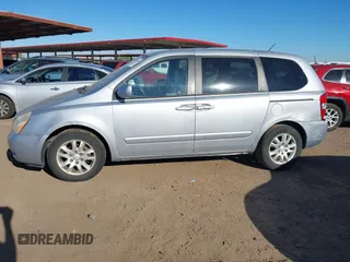 2008 Kia Sedona with VIN KNDMB133686227144, listed as a IAAI auction lot 41868692 with 124,269 mi miles. Bid and sale history available at carsss.com. Image 14.