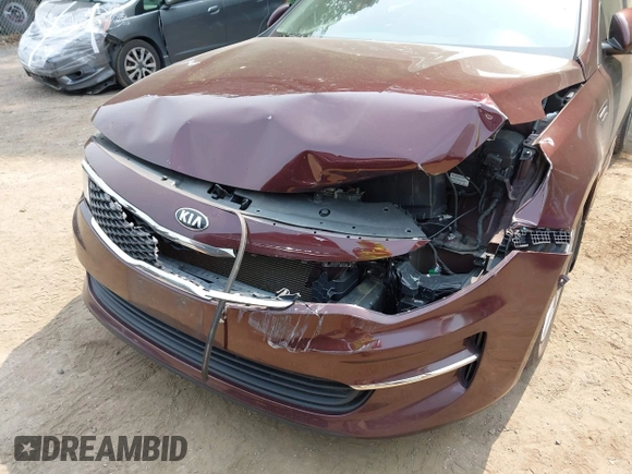 2018 Kia Optima LX with VIN 5XXGT4L36JG185545, listed as a IAAI auction lot 42434301 with 118,303 mi miles and . Bid and sale history available at DreamBid. Image 6.