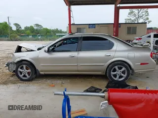 2000 Nissan Maxima GXE z VIN JN1CA31D8YT744603, wystawiony jako IAAI lot #42435490 z przebiegiem Nie podano mil oraz . Historia ofert i sprzedaży dostępna na DreamBid. Obrazek 15.