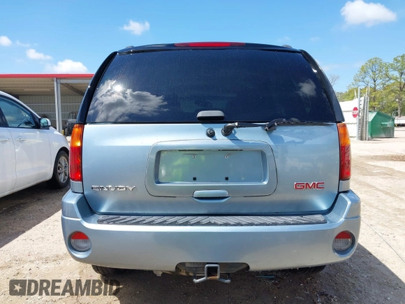 2006 GMC Envoy SLE with VIN 1GKDS13S362310613, listed as a IAAI auction lot 41881880 with 202,893 mi miles. Bid and sale history available at carsss.com. Image 16.