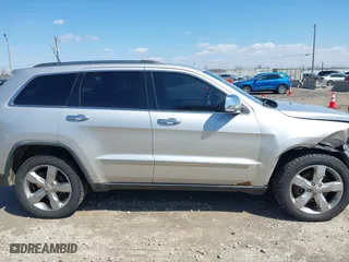 2011 Jeep Grand Cherokee Limited with VIN 1J4RR5GT9BC510322, listed as a IAAI auction lot 42003802 with 211,684 mi miles. Bid and sale history available at carsss.com. Image 13.