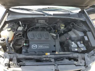 2002 Mazda Tribute LX with VIN 4F2YU09182KM12760, listed as a Copart auction lot 61292724 with 226,479 mi miles and Salvage Title. Bid and sale history available at carsss.com. Image 12.