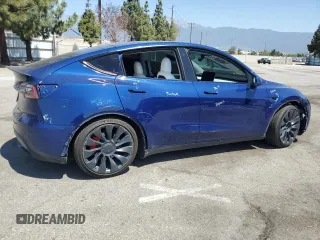 2021 Tesla Model Y Performance z VIN 5YJYGDEF0MF157795, wystawiony jako Copart lot #57163245 z przebiegiem 62 598 mil mil oraz Szkoda całkowita • Salvage title. Historia ofert i sprzedaży dostępna na DreamBid. Obrazek 3.
