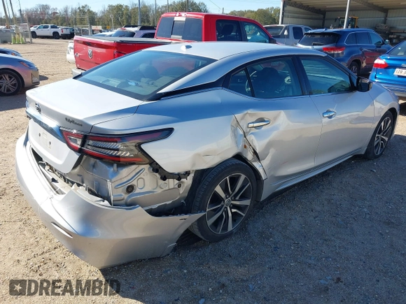 2019 Nissan Maxima SV with VIN 1N4AA6AV0KC371696, listed as a IAAI auction lot 41240863 with 143,348 mi miles and . Bid and sale history available at DreamBid. Image 4.