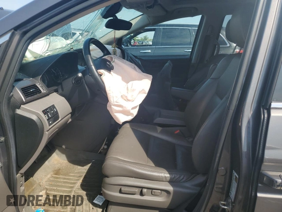 2014 Honda Odyssey EX-L with VIN 5FNRL5H61EB046093, listed as a Copart auction lot 61930335 with Not provided miles and Salvage title. Bid and sale history available at DreamBid. Image 7.