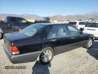 1993 Mercedes-Benz 500 z VIN WDBGA51E7PA107911, wystawiony jako Copart lot #82218754 z przebiegiem 113 328 mil mil oraz Tytuł czysty. Historia ofert i sprzedaży dostępna na DreamBid. Obrazek 3.