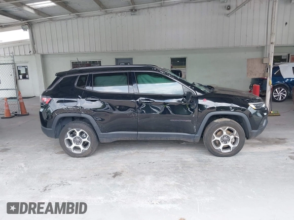 2022 Jeep Compass Trailhawk with VIN 3C4NJDDB5NT164201, listed as a IAAI auction lot 42214973 with 92,668 mi miles and . Bid and sale history available at DreamBid. Image 13.