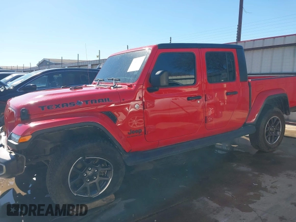 2021 Jeep Gladiator Freedom z VIN 1C6HJTAG7ML609661, wystawiony jako IAAI lot #41410756 z przebiegiem 44 636 mil mil oraz . Historia ofert i sprzedaży dostępna na DreamBid. Obrazek 14.