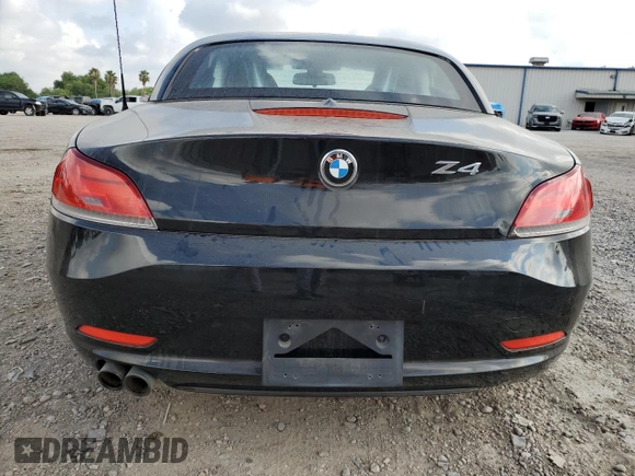2011 BMW Z4 sDrive30i with VIN WBALM5C54BE378752, listed as a Copart auction lot 58517654 with 86,596 mi miles and Clean Title. Bid and sale history available at carsss.com. Image 6.