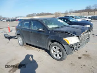 2010 Dodge Caliber SXT with VIN 1B3CB4HA4AD651946, listed as a IAAI auction lot 41771139 with 165,663 mi miles and . Bid and sale history available at DreamBid. Image 1.