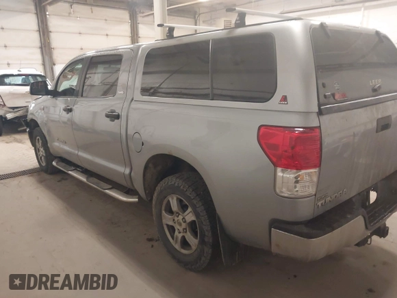 2011 Toyota Tundra 4WD Truck with VIN 5TFDW5F16BX187753, listed as a IAAI auction lot 42003416 with 239,476 mi miles. Bid and sale history available at carsss.com. Image 3.