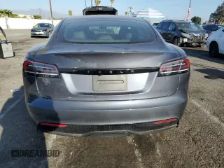 2023 Tesla Model S с VIN 5YJSA1E55PF522232, выставлен на аукционе Copart как лот 47735815 с пробегом Не указан миль и Списание • Salvage title. История ставок и продаж доступна на DreamBid. Изображение 6.