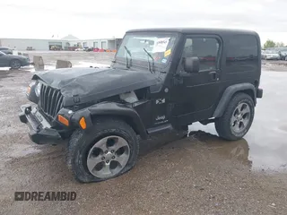 2004 Jeep Wrangler X with VIN 1J4FA39S34P753865, listed as a IAAI auction lot 41948545 with 198,169 mi miles. Bid and sale history available at carsss.com. Image 17.