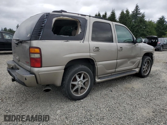 2002 GMC Yukon Denali z VIN 1GKEK63U82J224913, wystawiony jako Copart lot #60664885 z przebiegiem 208 794 mil mil oraz Szkoda całkowita • Salvage title. Historia ofert i sprzedaży dostępna na DreamBid. Obrazek 3.