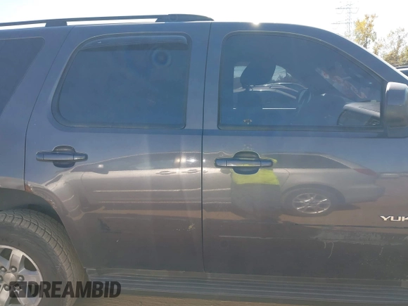 2011 GMC Yukon SLE with VIN 1GKS2AE04BR207818, listed as a IAAI auction lot 40669731 with 312,959 mi miles. Bid and sale history available at carsss.com. Image 13.