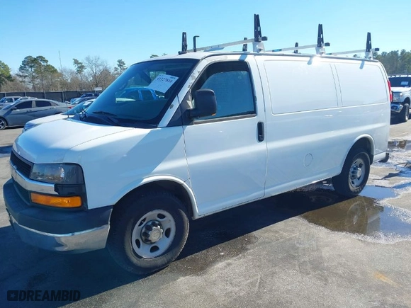 2012 Chevrolet Express Cargo Van with VIN 1GCWGFCA7C1100284, listed as a IAAI auction lot 41327810 with 211,077 mi miles. Bid and sale history available at carsss.com. Image 2.