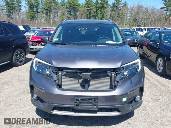 2021 Honda Pilot EX-L with VIN 5FNYF6H59MB016354, listed as a IAAI auction lot 42108020 with 61,436 mi miles and . Bid and sale history available at DreamBid. Image 13.