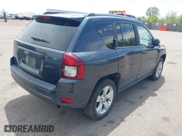 2015 Jeep Compass Sport with VIN 1C4NJDBB6FD152147, listed as a IAAI auction lot 42182589 with 137,385 mi miles and . Bid and sale history available at carsss.com. Image 4.