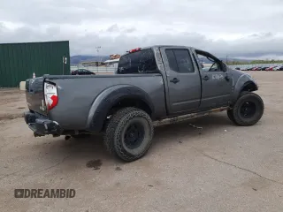 2008 Nissan Frontier LE with VIN 1N6AD09W58C437225, listed as a Copart auction lot 52687295 with 247,258 mi miles and Salvage title. Bid and sale history available at DreamBid. Image 3.