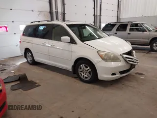 2005 Honda Odyssey EX-L z VIN 5FNRL38795B071160, wystawiony jako IAAI lot #41947806 z przebiegiem 209 469 mil mil oraz . Historia ofert i sprzedaży dostępna na DreamBid. Obrazek 1.
