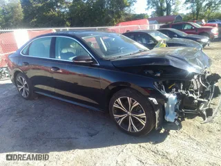 2021 Volkswagen Passat 2.0T SE with VIN 1VWSA7A34MC014993, listed as a IAAI auction lot 40556424 with 64,508 mi miles. Bid and sale history available at carsss.com. Image 14.