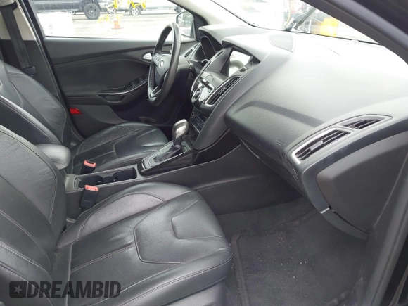 2017 Ford Focus Titanium with VIN 1FADP3N2XHL230766, listed as a IAAI auction lot 42386275 with 64,138 mi miles and . Bid and sale history available at DreamBid. Image 5.
