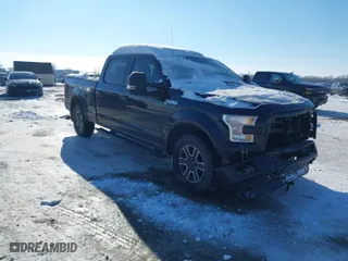 2015 Ford F-150 XLT w/HD Payload Pkg with VIN 1FTFW1EF6FFC08787, listed as a IAAI auction lot 41290445 with 136,293 mi miles. Bid and sale history available at carsss.com. Image 1.