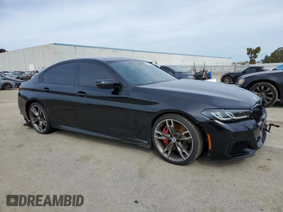 2023 BMW 5 Series M550i xDrive with VIN WBA13BK0XPCM98878, listed as a Copart auction lot 45580685 with 10,866 mi miles and Salvage title. Bid and sale history available at DreamBid. Image 4.