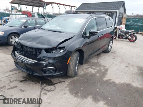 2022 Chrysler Pacifica Touring L z VIN 2C4RC3BG6NR164599, wystawiony jako IAAI lot #41727606 z przebiegiem 17 078 mil mil oraz . Historia ofert i sprzedaży dostępna na DreamBid. Obrazek 17.