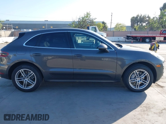 2015 Porsche Macan S with VIN WP1AB2A53FLB54910, listed as a IAAI auction lot 41990015 with 95,038 mi miles and . Bid and sale history available at DreamBid. Image 13.