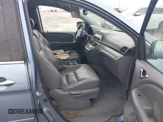 2007 Honda Odyssey EX-L z VIN 5FNRL38647B139018, wystawiony jako IAAI lot #41712602 z przebiegiem 243 473 mil mil oraz . Historia ofert i sprzedaży dostępna na DreamBid. Obrazek 5.