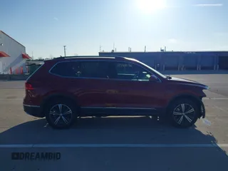 2018 Volkswagen Tiguan SEL z VIN 3VV2B7AX6JM039344, wystawiony jako IAAI lot #41934536 z przebiegiem 93 838 mil mil oraz . Historia ofert i sprzedaży dostępna na DreamBid. Obrazek 14.