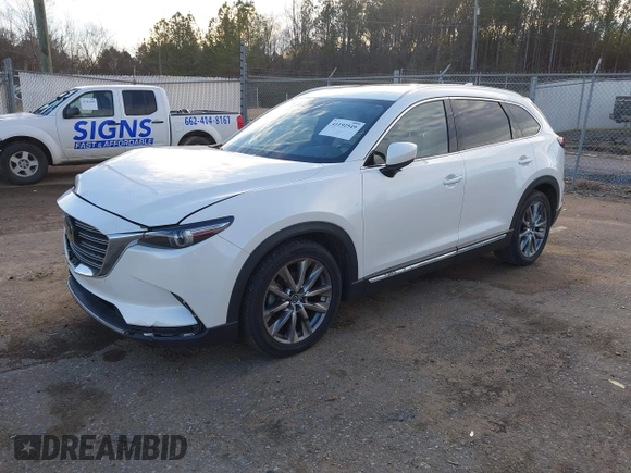 2016 Mazda CX-9 Grand Touring z VIN JM3TCADY4G0124588, wystawiony jako IAAI lot #41192549 z przebiegiem 161 272 mil mil oraz . Historia ofert i sprzedaży dostępna na DreamBid. Obrazek 18.