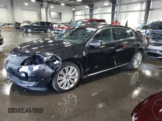 2014 Lincoln MKS EcoBoost z VIN 1LNHL9FT5EG607814, wystawiony jako Copart lot #47070705 z przebiegiem 187 410 mil mil oraz Nie do naprawy • Non repairable. Historia ofert i sprzedaży dostępna na DreamBid. Obrazek 1.