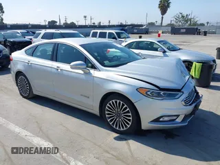 2018 Ford Fusion Titanium with VIN 3FA6P0RU7JR174229, listed as a IAAI auction lot 42641176 with 91,975 mi miles and . Bid and sale history available at DreamBid. Image 1.