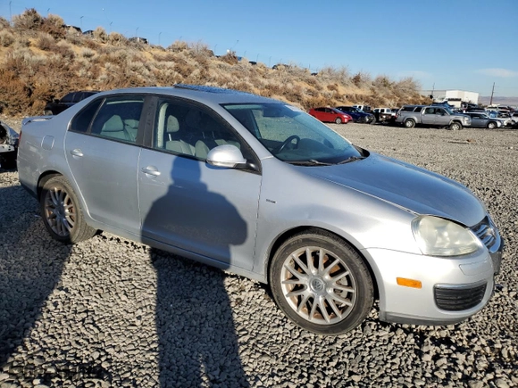 2008 Volkswagen Jetta Sedan Wolfsburg with VIN 3VWRJ71K98M145203, listed as a Copart auction lot 83037584 with 184,490 mi miles and Clean Title. Bid and sale history available at carsss.com. Image 4.