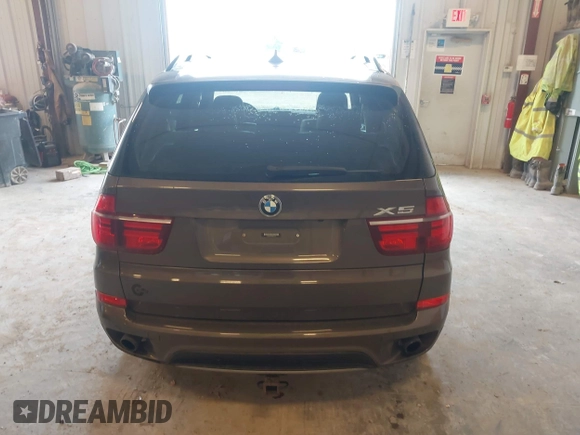 2013 BMW X5 xDrive35i z VIN 5UXZV4C54D0B21144, wystawiony jako IAAI lot #42304165 z przebiegiem 164 673 mil mil oraz . Historia ofert i sprzedaży dostępna na DreamBid. Obrazek 16.