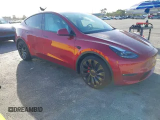2024 Tesla Model Y Performance with VIN 7SAYGDEF5RF038831, listed as a IAAI auction lot 41573953 with 18 mi miles and . Bid and sale history available at DreamBid. Image 1.