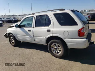 2004 Isuzu Rodeo S z VIN 4S2CK58W044317034, wystawiony jako Copart lot #42401765 z przebiegiem 110 639 mil mil oraz Szkoda całkowita • Salvage title. Historia ofert i sprzedaży dostępna na DreamBid. Obrazek 2.
