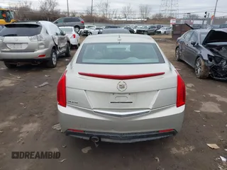 2013 Cadillac ATS z VIN 1G6AA5RA5D0131069, wystawiony jako IAAI lot #41708927 z przebiegiem 166 624 mil mil oraz . Historia ofert i sprzedaży dostępna na DreamBid. Obrazek 16.
